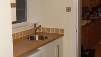 kitchen with sink and washing machine