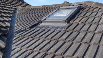 roof tiles on top of house with velux window