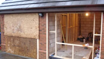 removal of garage doors prior to installation of windows and brickwork