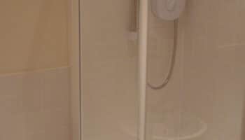 Shower Enclosure with white shower