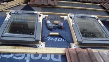 two velux windows being fitted