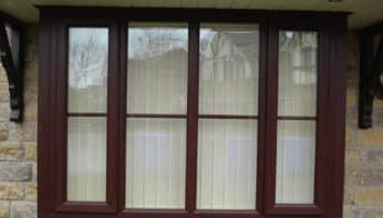 outside shot of dark wood window