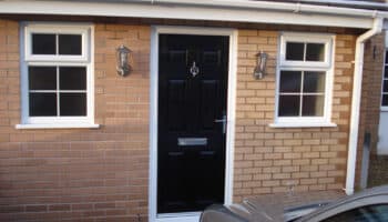 garage conversion with black door