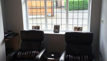 garage conversion with projector and two seats